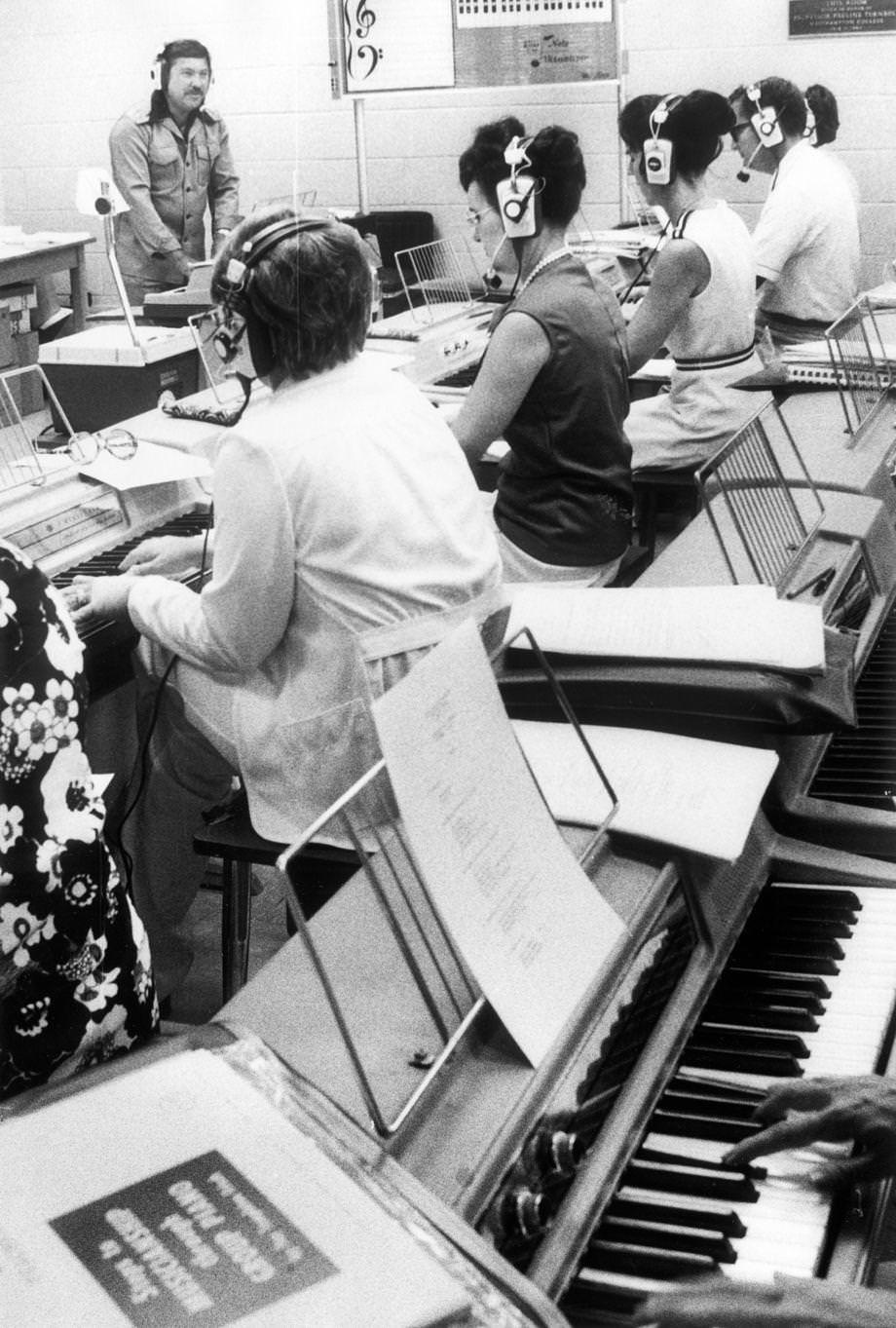 #87 Larry Rast directed a group piano class at the University of Richmond, 1975.