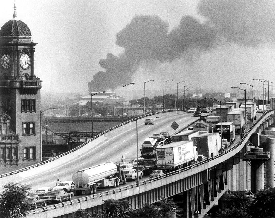 #90 Southbound traffic on Interstate 95 backed up past Main Street Station as smoke billowed from a fire at Little Oil Co. in South Richmond, 1975.