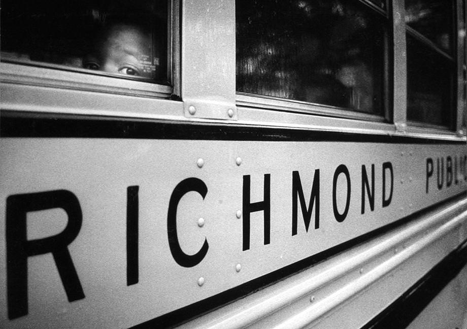 #155 A black student peered out of a Richmond Public Schools bus on a rainy morning in August 1970 as cross-town busing began in the city.