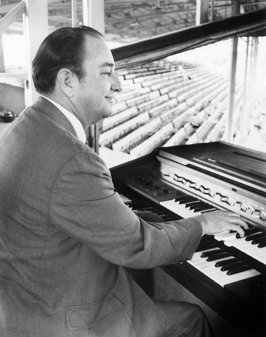 #156 Bob Powell at his keyboard, high in the grandstand at Parker Field in Richmond, 1970.