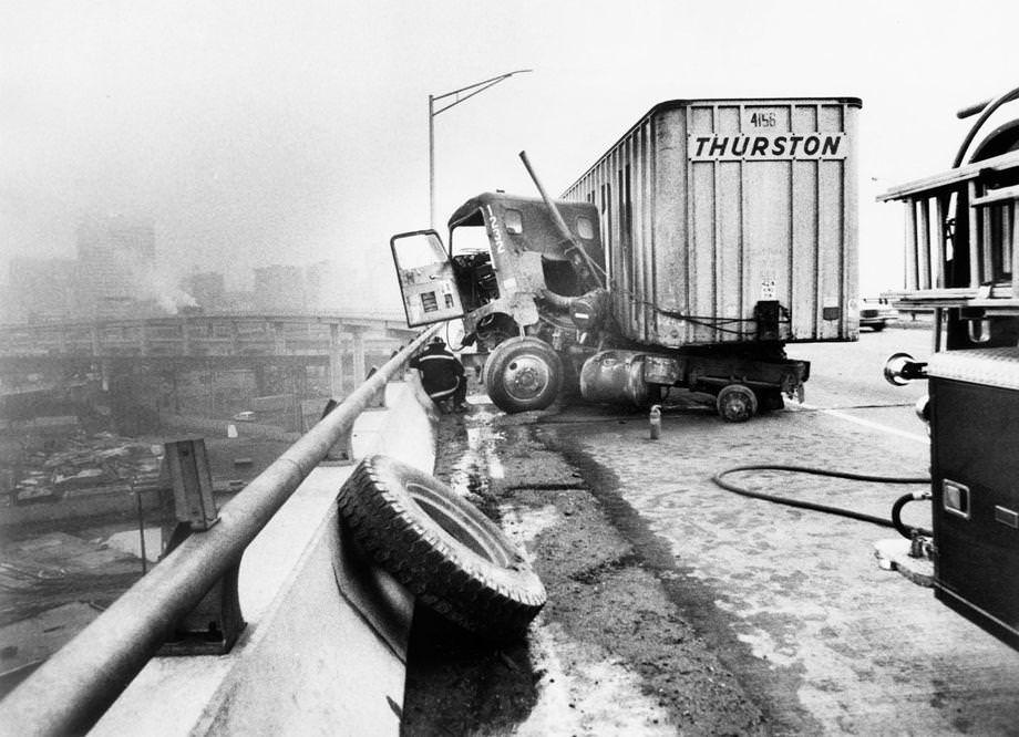 #11 A tractor-trailer jackknifed after two wheels came off on the James River Bridge in Richmond, 1979.