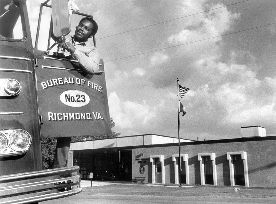 #182 James Jackson polished a mirror on one of Engine Co. No. 23’s fire trucks at the new 4th Battalion headquarters, located at 400 LaBrook Concourse in South Richmond, 1970.