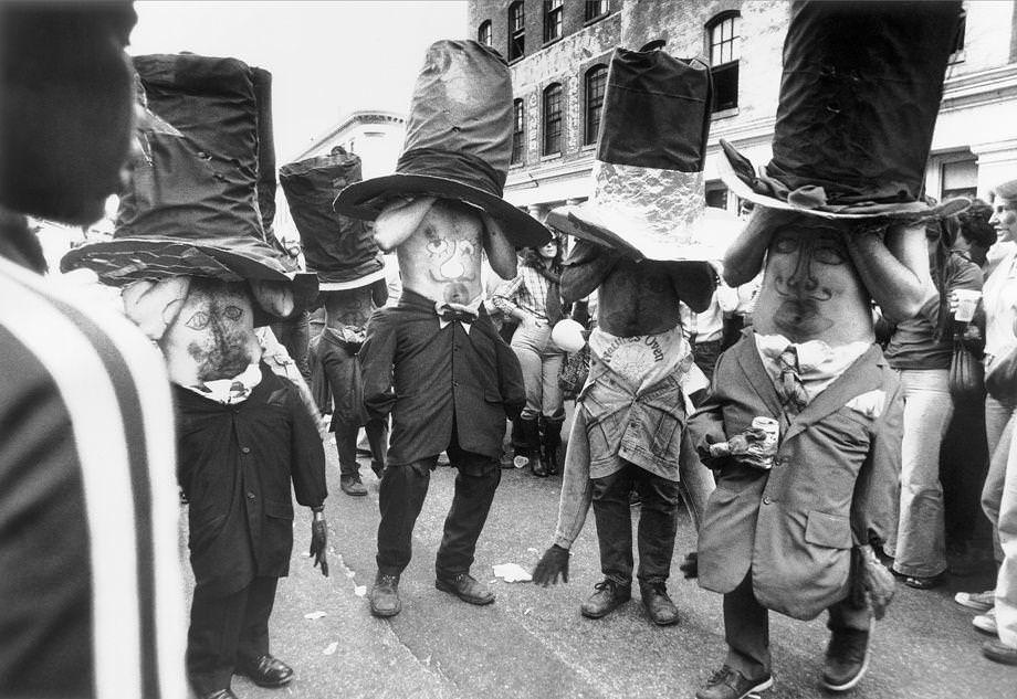 #23 A group of mad hatters danced in Shockoe Slip during the Great Pumpkin Party. The Halloween-themed festival drew about 10,000 people, many of them in costume to participate in contests for cash prizes, 1978.