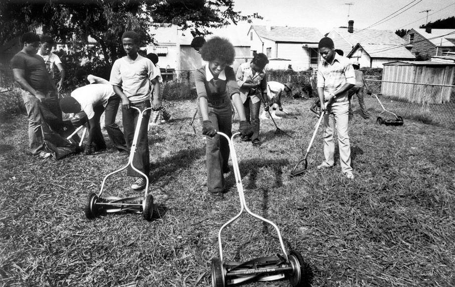 #43 Richmond youths did yard work as part of a summer employment assignment administered by the Richmond Area Manpower Planning Systems, 1976.