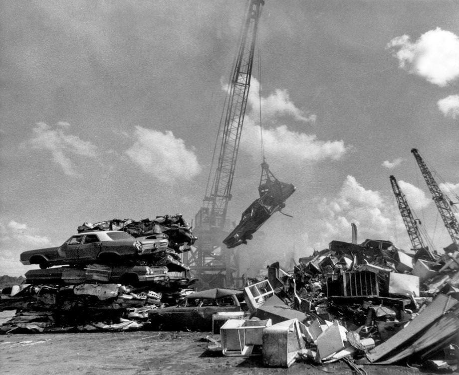 #46 Cars and other scrap metal awaited shredding at Peck Iron and Metal Co. Inc., located off Commerce Road n South Richmond, 1976.