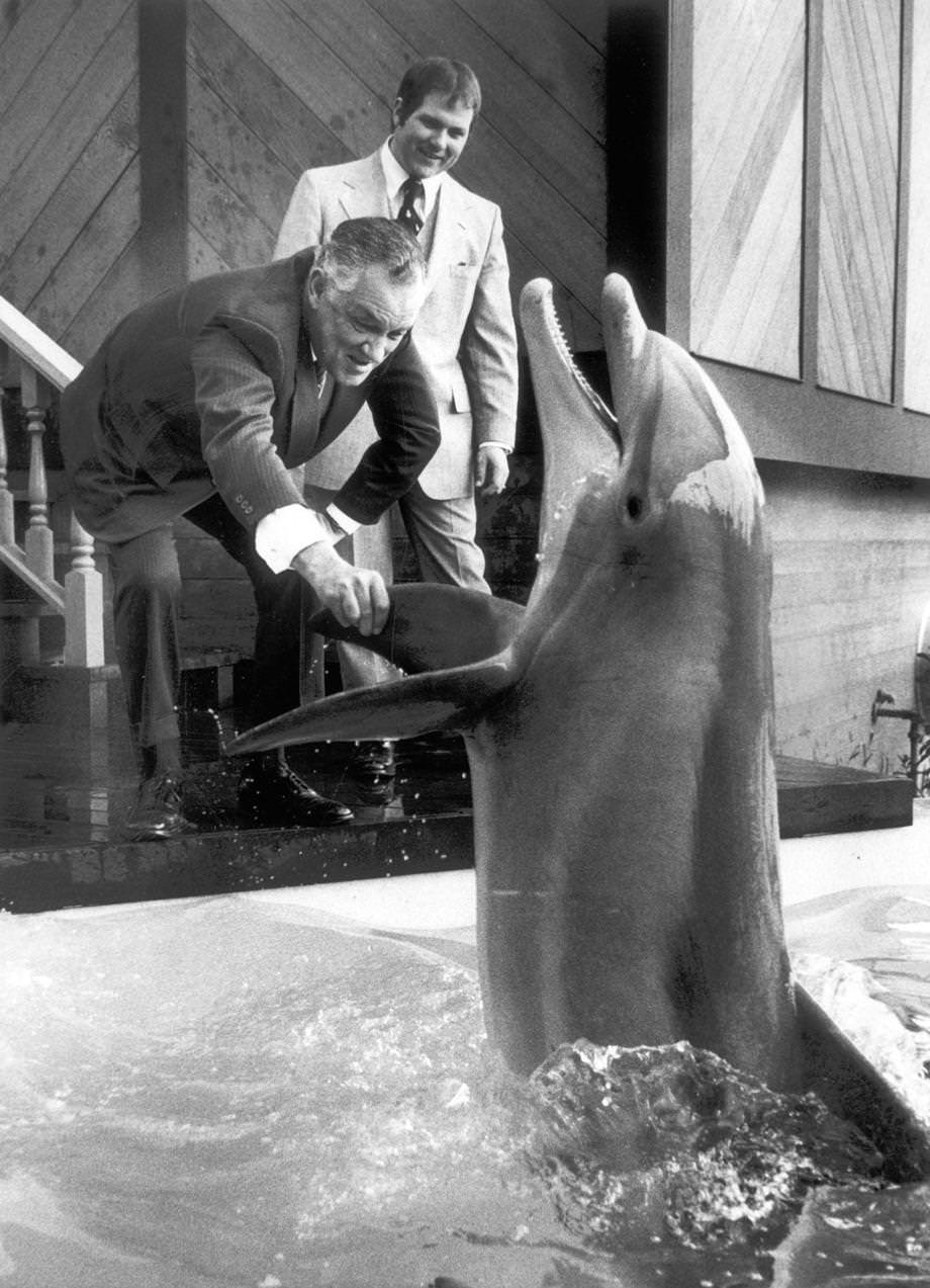 #69 Gov. Mills E. Godwin Jr. greeted a porpoise on the opening day of the Kings Dominion in Doswell, 1975.