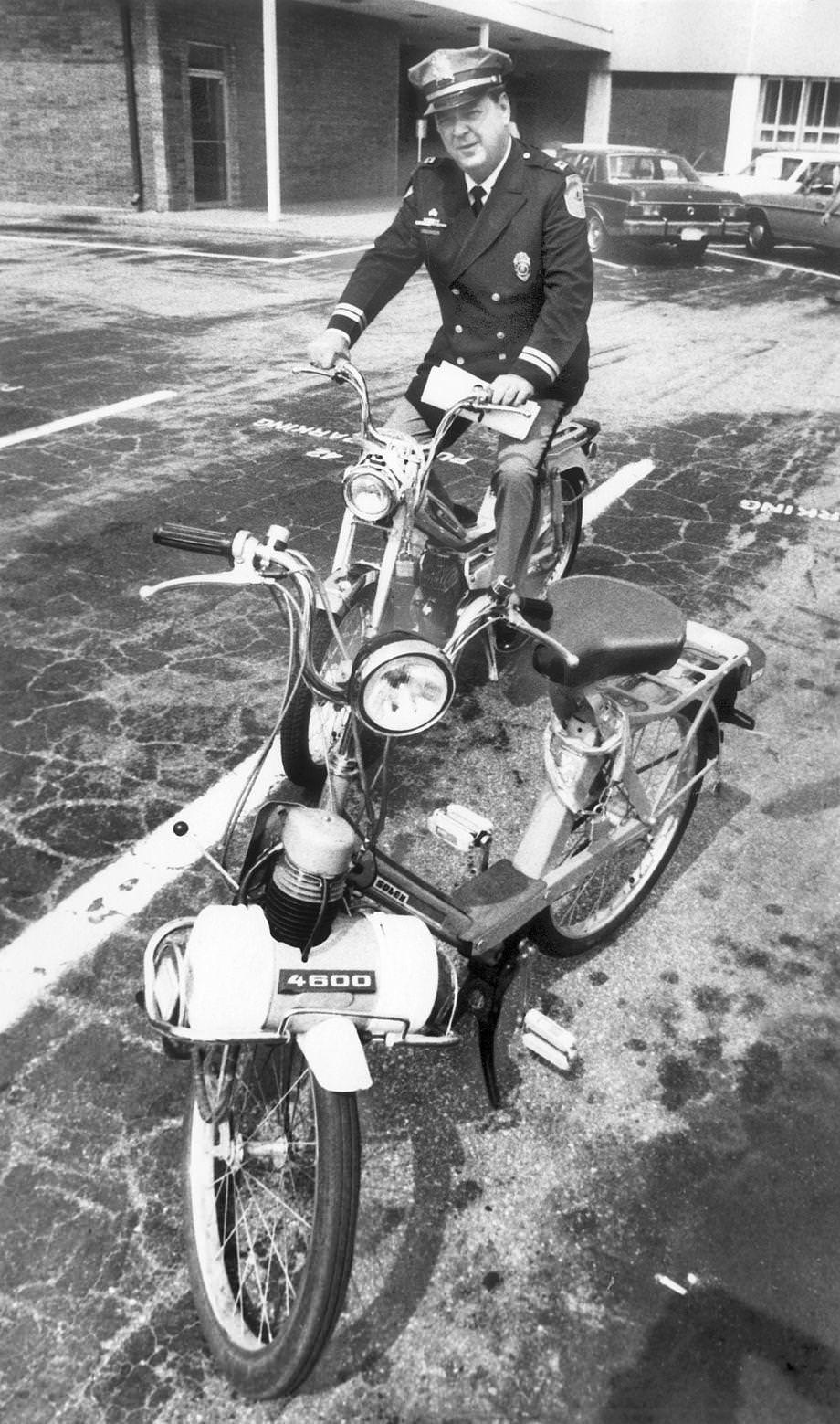 #70 Richmond police Capt. Joseph H. Parker sat on a motorized bike and explained new regulations, 1975.