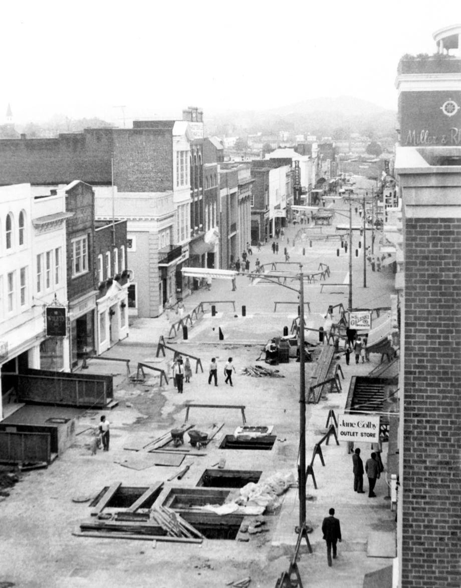 #78 The Downtown Mall in Charlottesville was in the final phase of initial construction, with some of the square holes in the former Main Street slated to be filled with landscaping, 1975.