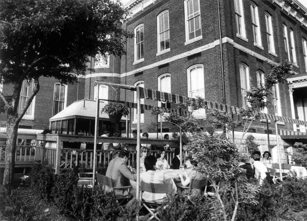 #8 Patrons of Stonewall Café on West Main Street in Richmond dined on the restaurant’s patio, 1983