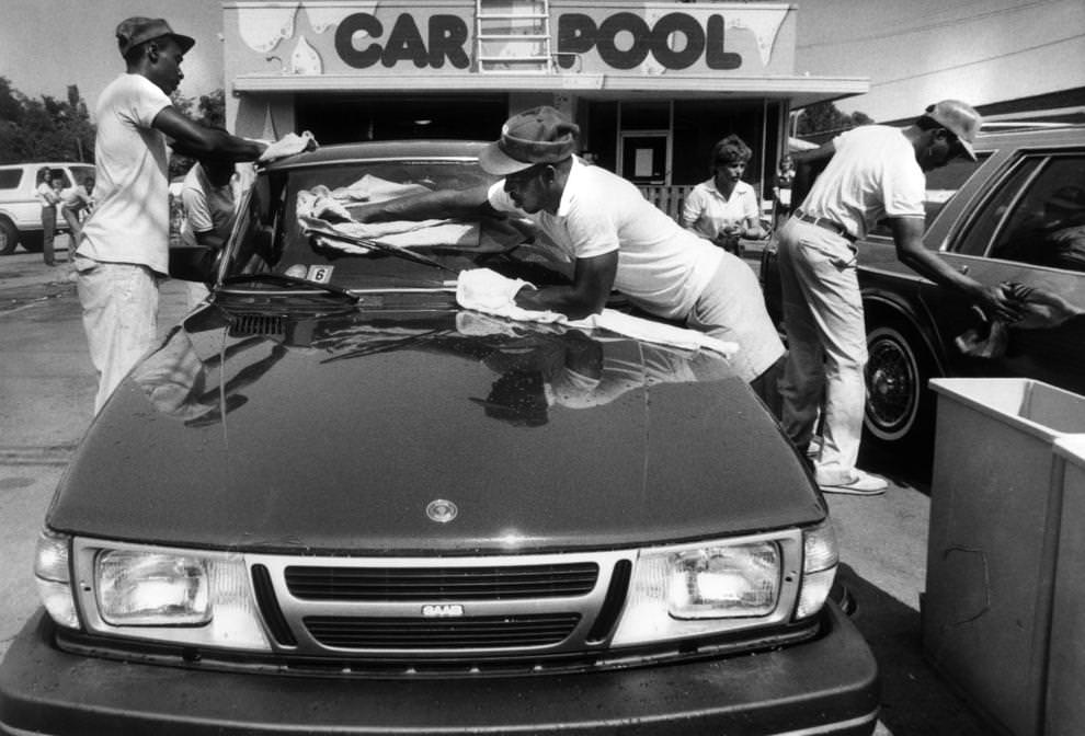 #92 Employees at a Car Pool location in Richmond wiped off vehicles after the wash cycle, 1985