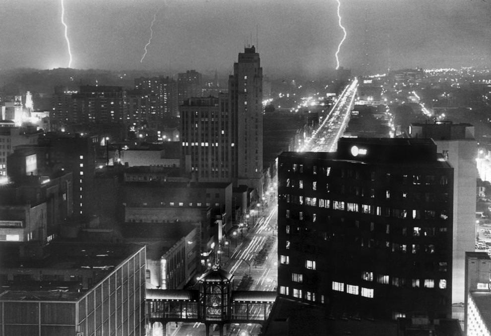 #20 An illuminated Broad Street in Richmond from the City Hall observation deck during a series of torrential rains around Labor Day, 1987