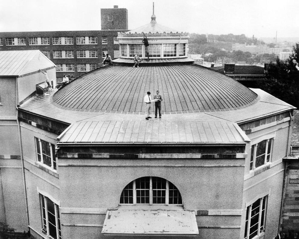 #33 Historic Richmond Foundation leader John G. Zehmer Jr. (center left) reviewed roof plans with architect Kenneth MacIlroy at Monumental Church on East Broad Street in Richmond.