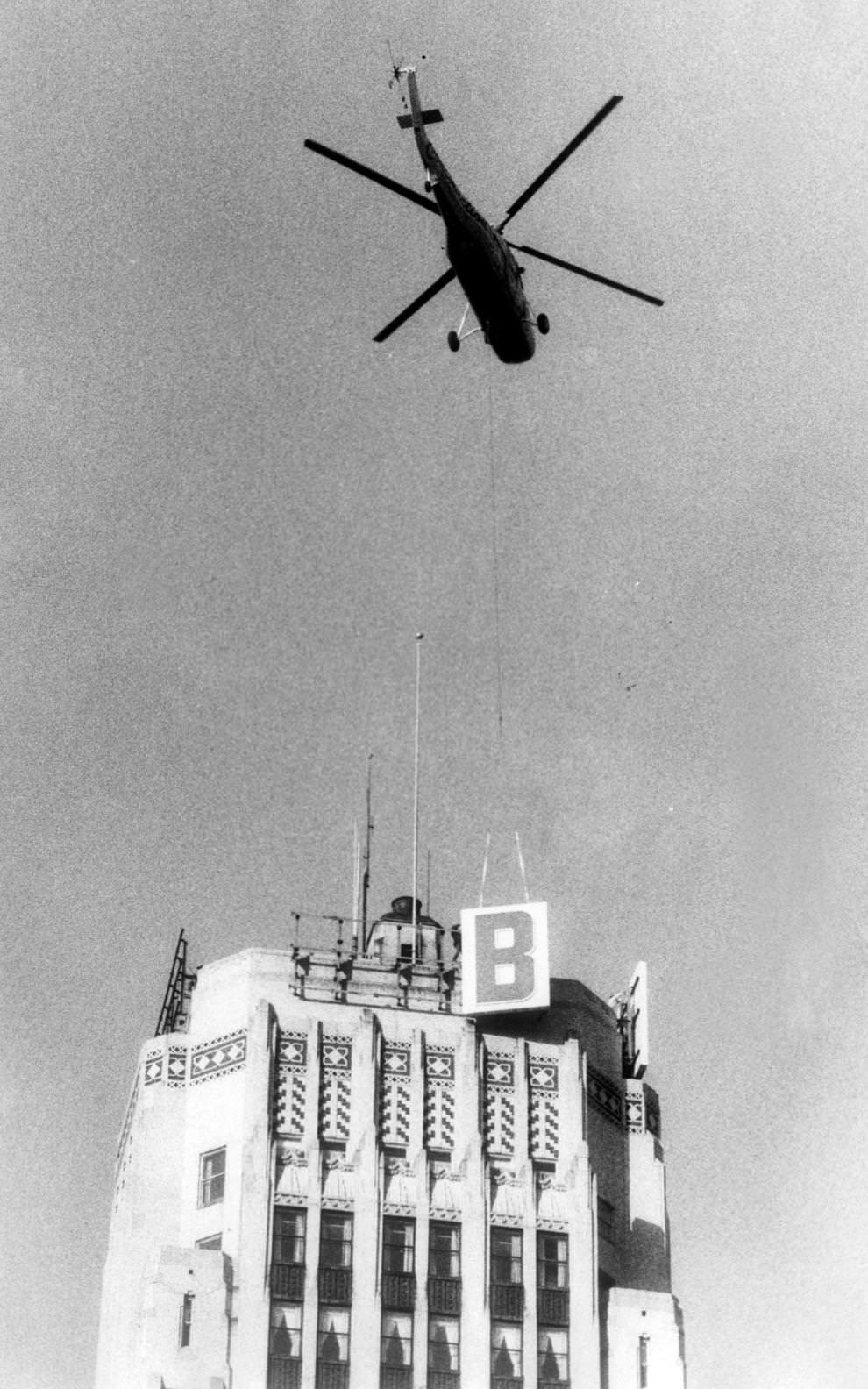 #60 A helicopter removed the letters “CFB” from the Central Fidelity Bank building at Third and Broad streets in downtown Richmond, 1986.