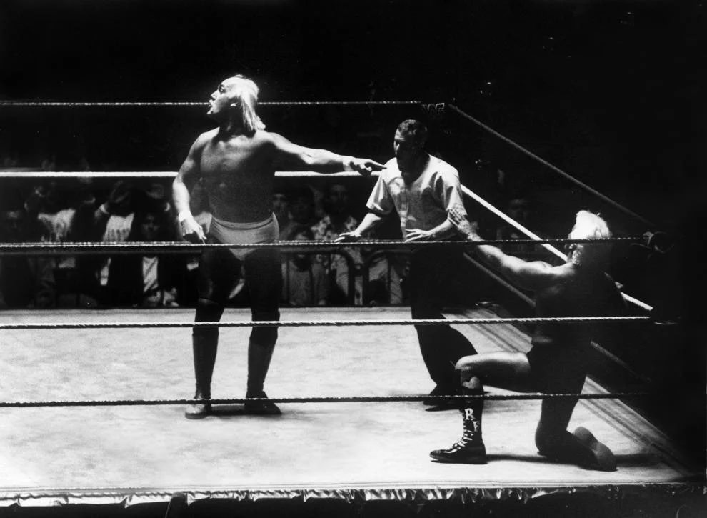#24 Wrestlers Hulk Hogan (left) and Ric Flair battled in front of a huge crowd at the Richmond Coliseum, 1991