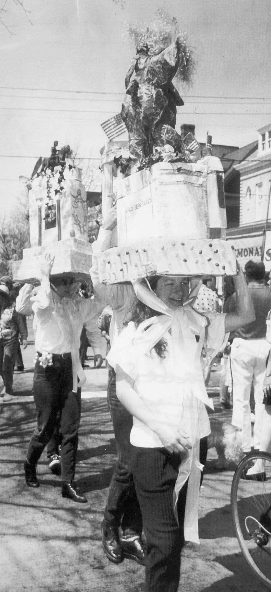 #44 Front to back: Catherine Fleishman and her friends walk down Monument Ave. Catherine will have their bonnets in the Easter Bonnet competition, 1992.