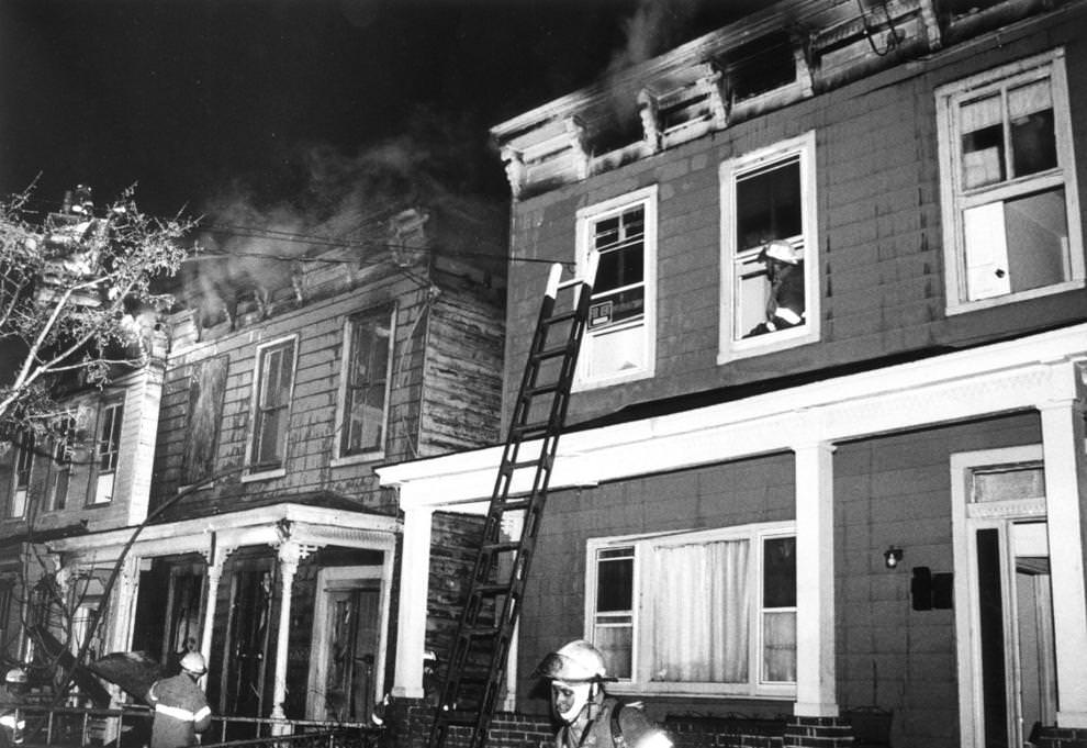 #46 Wind-Blown sparks from the fire at 702 N. 24th St. (center) set the two adjoining house afire, 1992