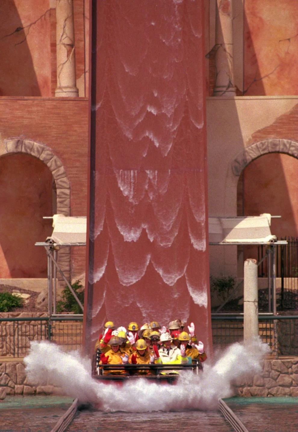 #5 A boat load of fire fighters come down the flume as Busch Gardens, Williamsburg opens its newest attraction ‘Escape from Pompeii’ a fire and water ride located in the Italy section of the park, 1995