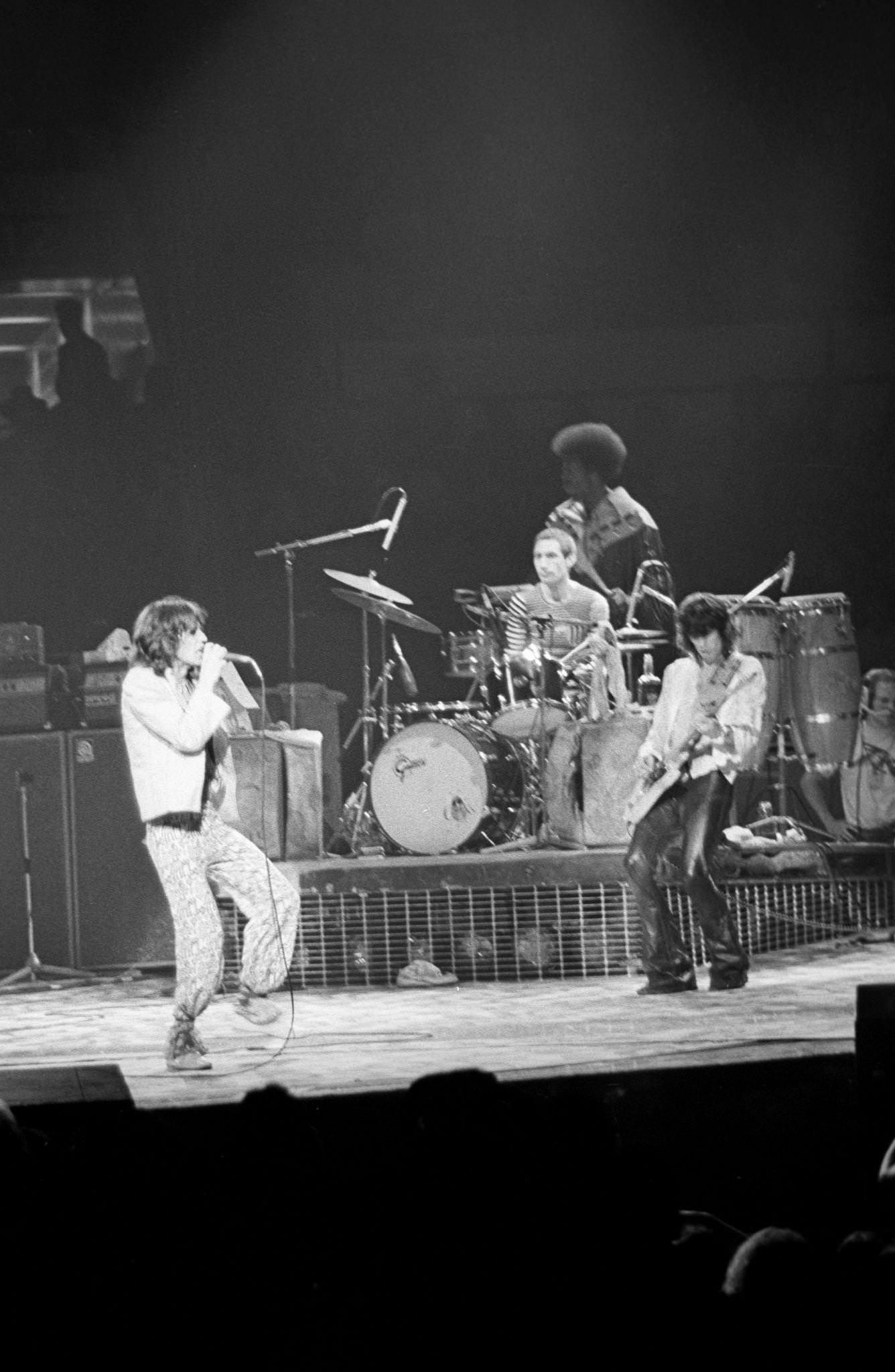 Mick Jagger, Keith Richards, and Charlie Watts perform with percussionist Ollie Brown at Madison Square Garden during the band’s “Tour of America ’75” on June 25, 1975, in New York, New York.