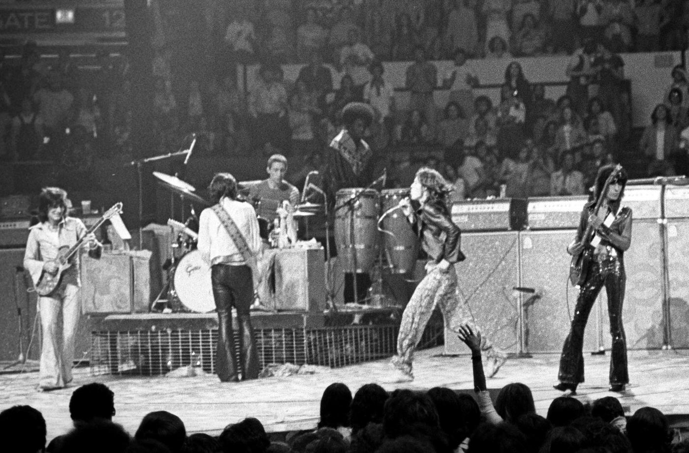 Ronnie Wood, Keith Richards, Charlie Watts, Mick Jagger, and Bill Wyman perform with percussionist Ollie Brown at Madison Square Garden during the band’s “Tour of America ’75” on June 25, 1975, in New York, New York.