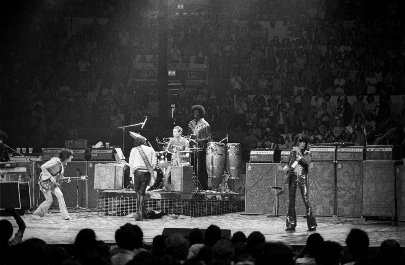 Ronnie Wood, Keith Richards, Charlie Watts, Bill Wyman, Mick Jagger, Ollie Brown, and Billy Preston perform at Madison Square Garden during the band’s “Tour of America ’75” on June 25, 1975, in New York, New York.