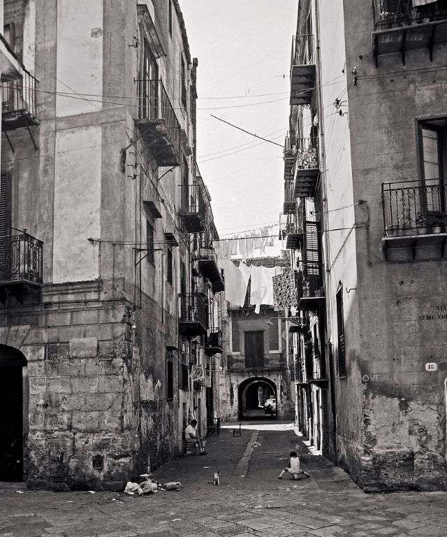#40 Way chairs flying, Palermo, Sicily, 1973