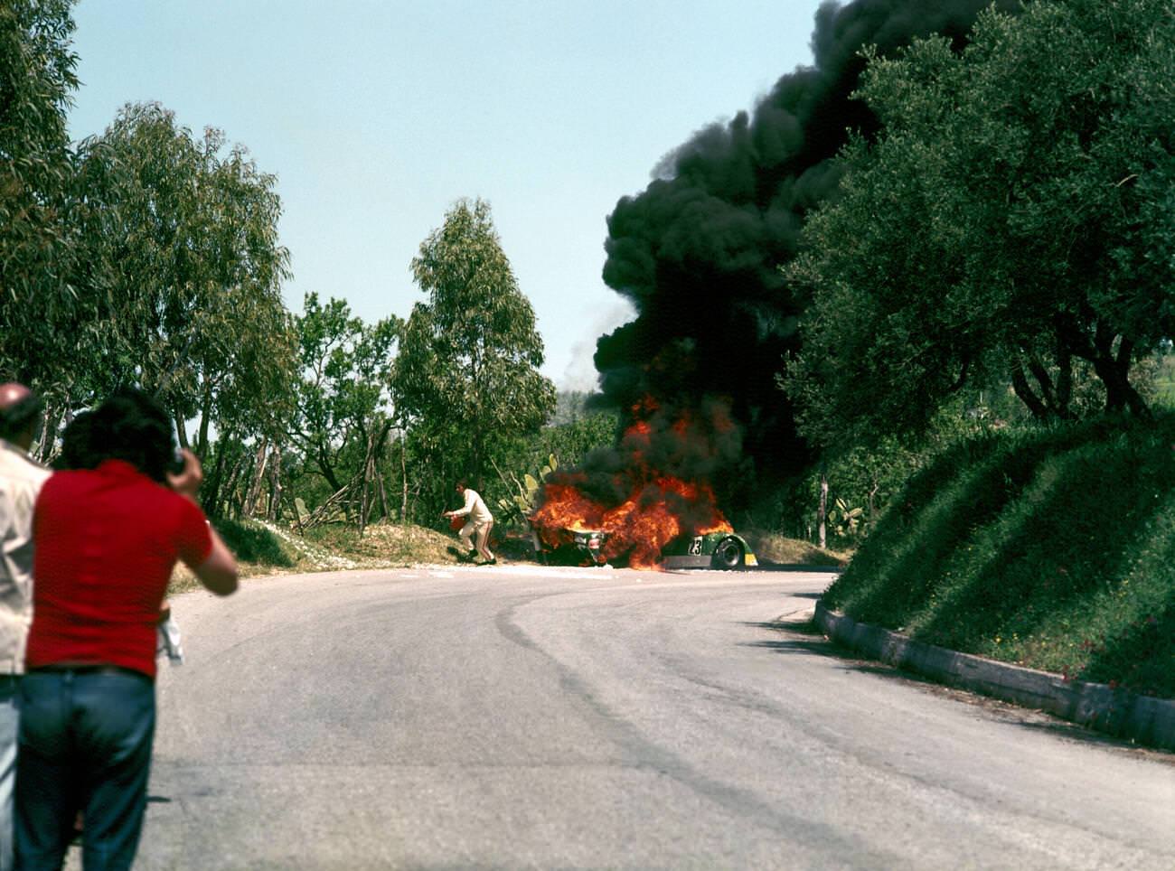 #82 Burning car crash involving Abele Tanghetti’s Chevron B21 in the Targa Florio race in Sicily, 1973.
