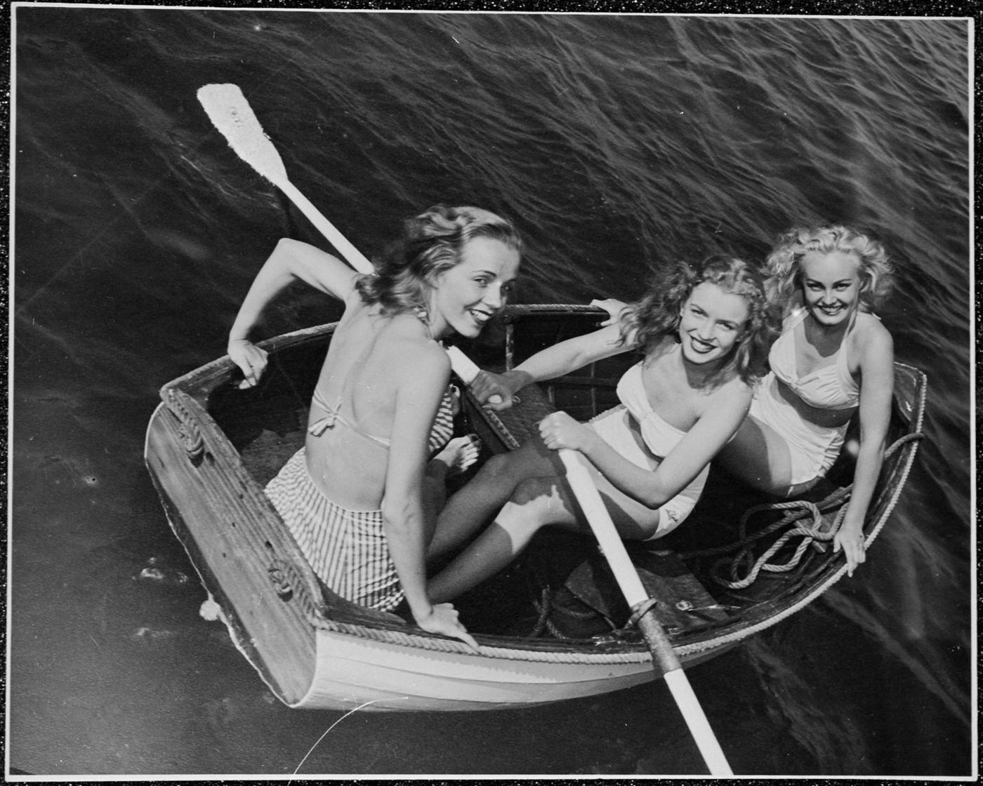 #16 Marilyn Monroe out rowing with friends, 1941.