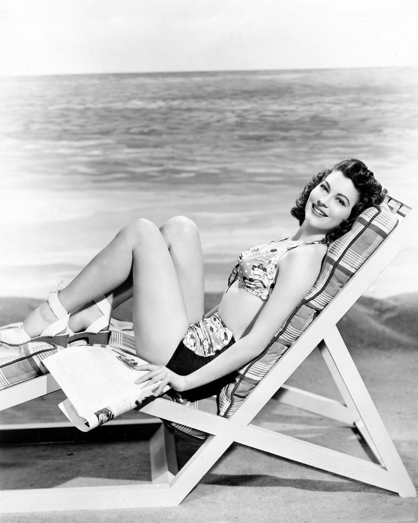 #29 Ava Gardner relaxing in a deckchair, 1945.