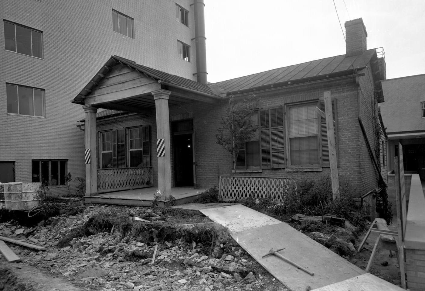 #18 Construction Underway at Old House Adjacent to Commodore Perry Hotel, 1950