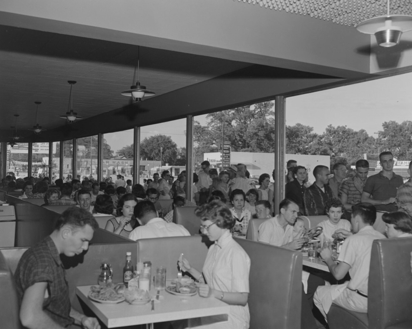 #17 Customers Dining Inside Youngblood’s Fried Chicken Restaurant, Austin, 1958.