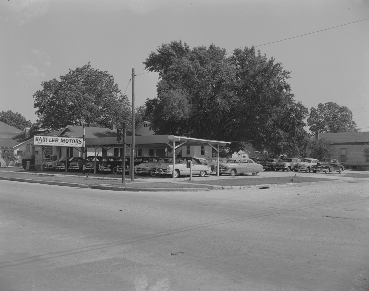 #55 Haufler Motors Exterior with Cars for Sale, 1953