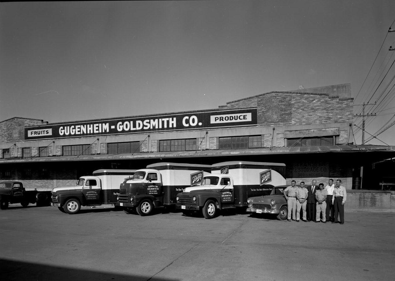#29 Exterior of Gugenheim-Goldsmith Produce Company with Trucks, 1957.