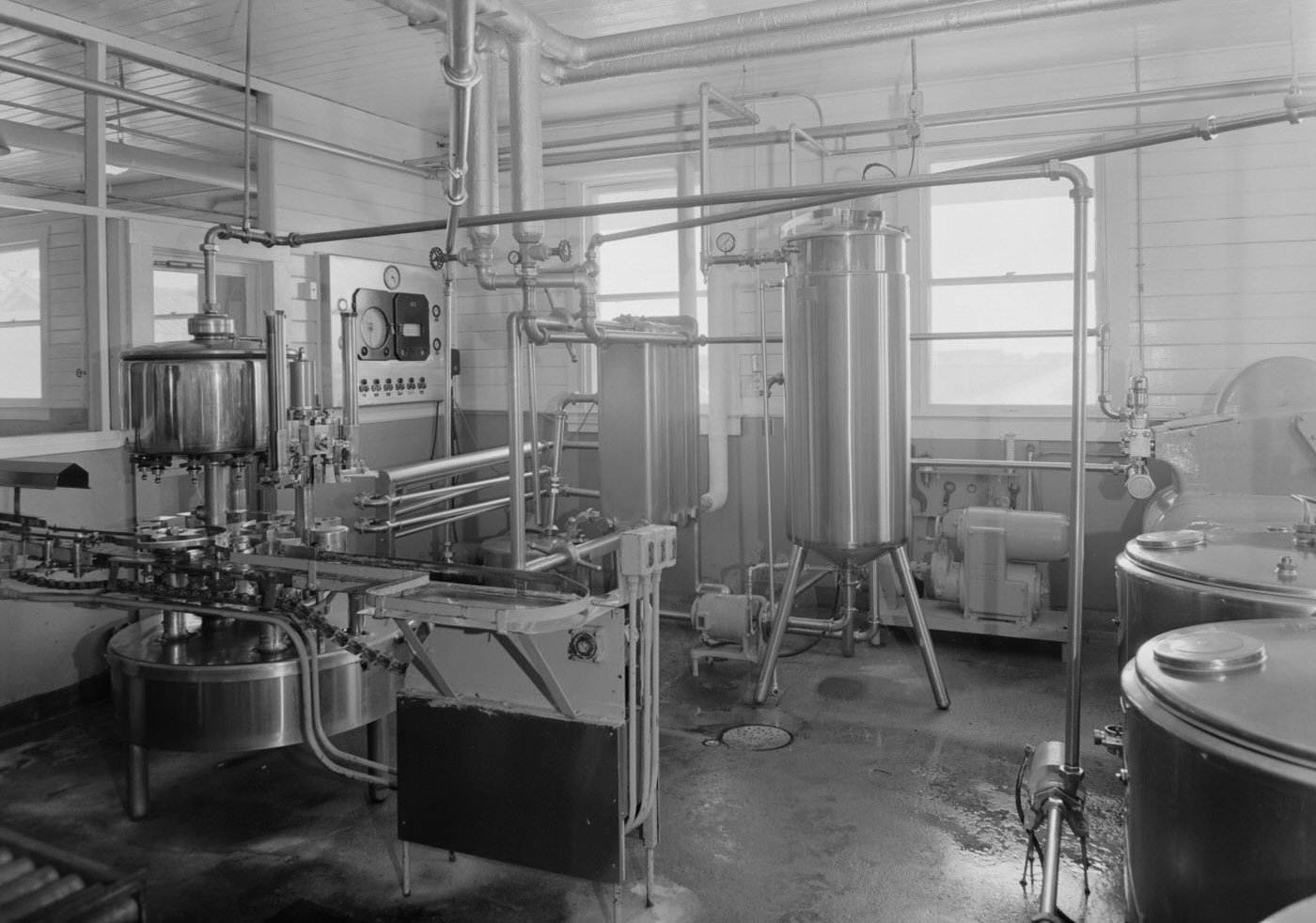 #90 Interior of Hillcrest Farms with Dairy Equipment, 1957.