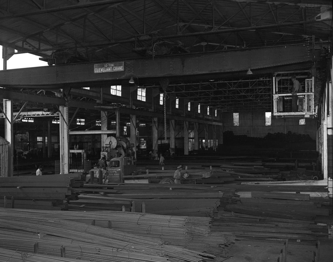 #104 Stacks of Materials at Engine Works, 1950.