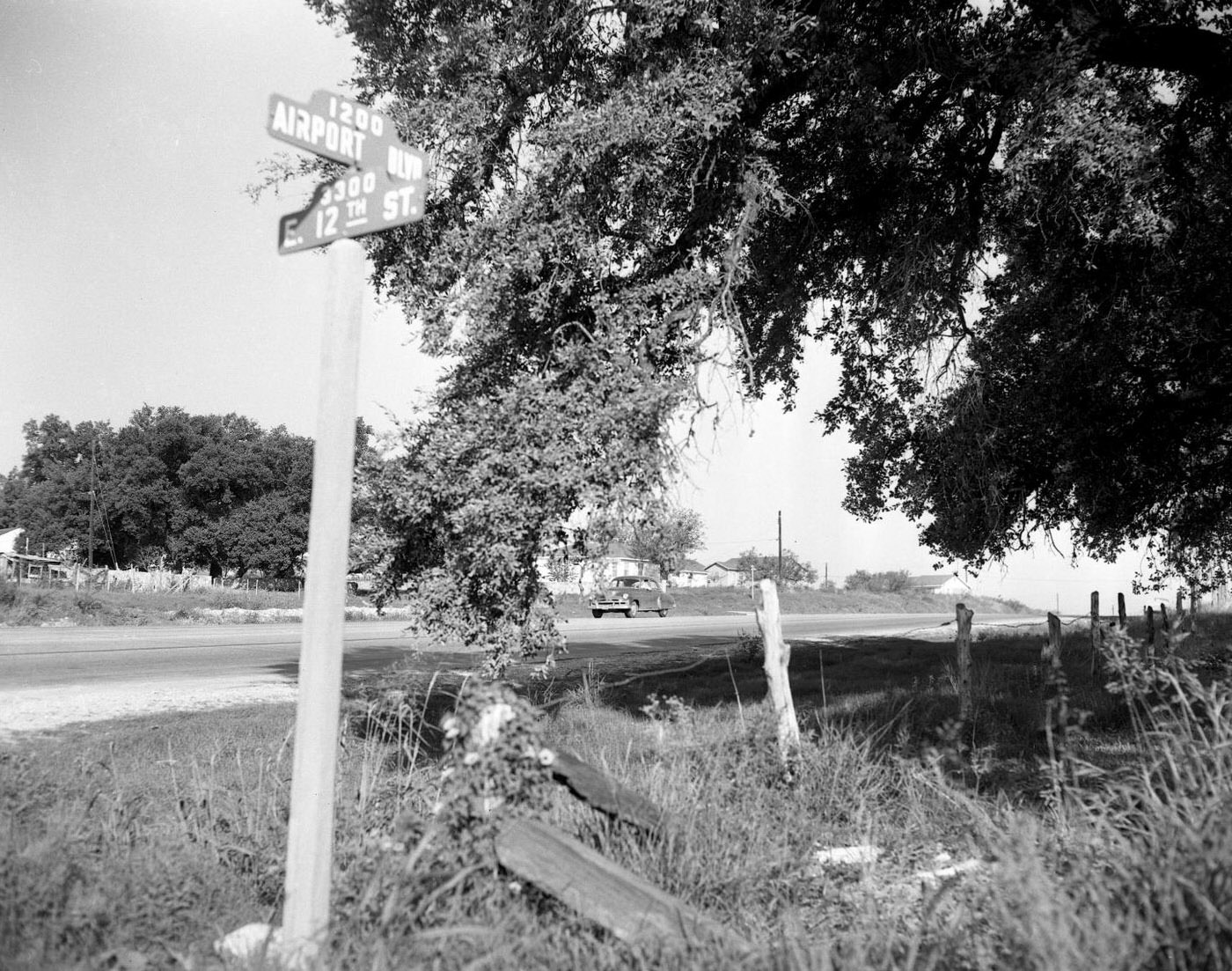 #111 Intersection of Airport Blvd and E. 12th St from Roadside, 1951.