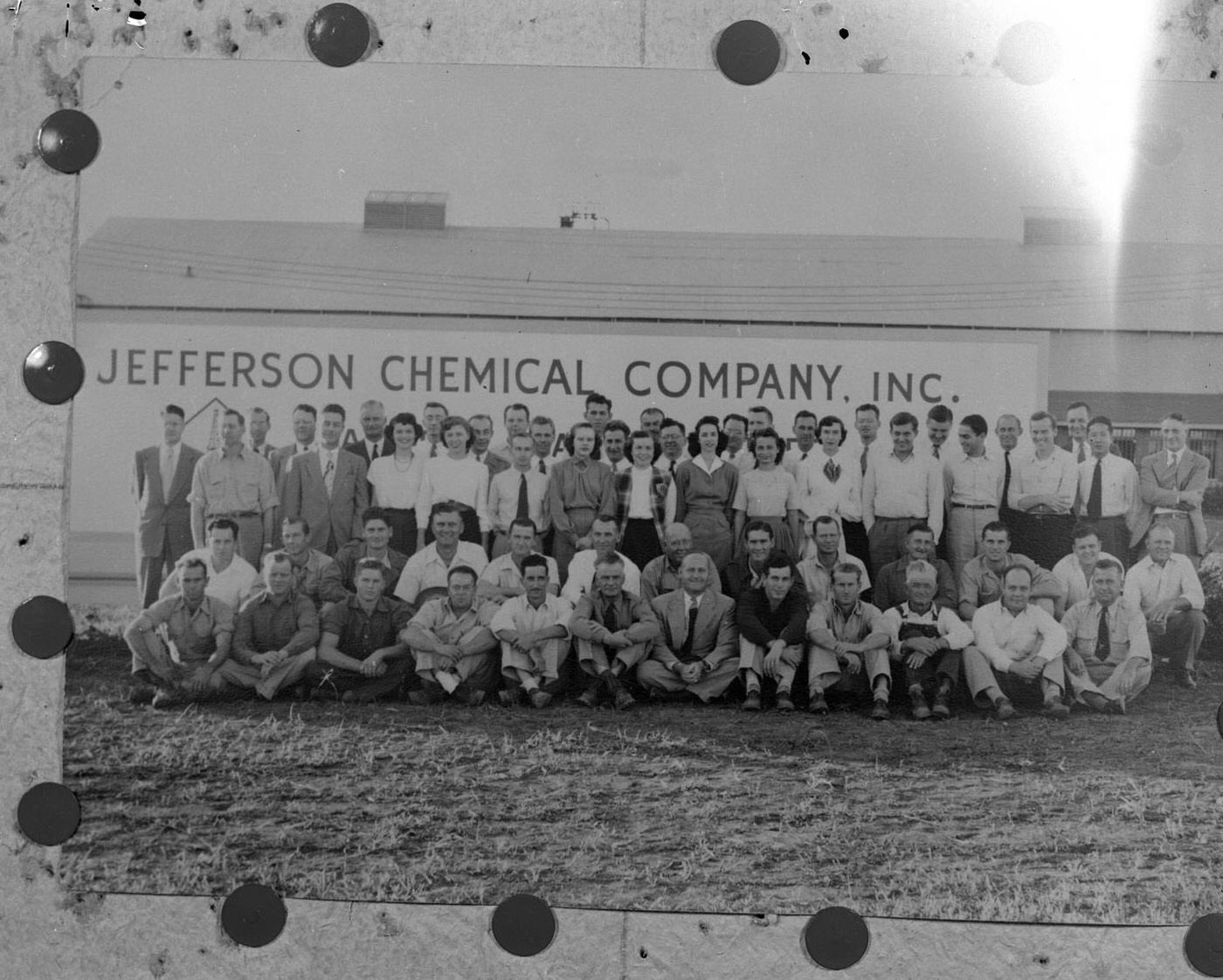 #7 Jefferson Chemical Company Employees in Front of Sign, 1950.