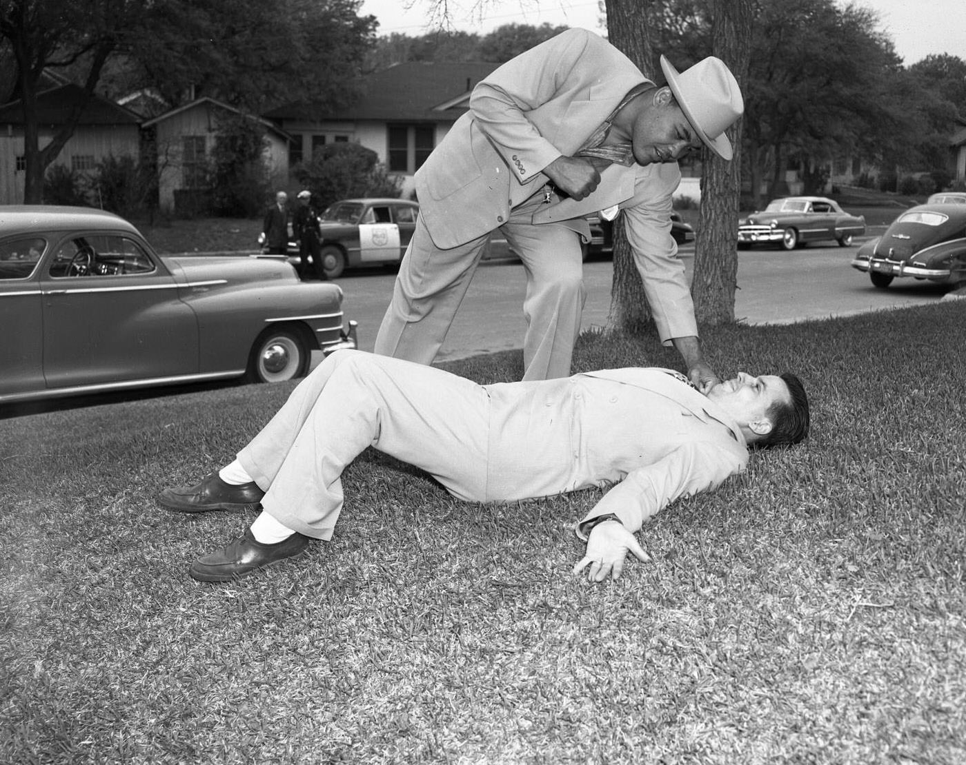 #8 Joe Louis Standing Over Man on Ground, 1950.