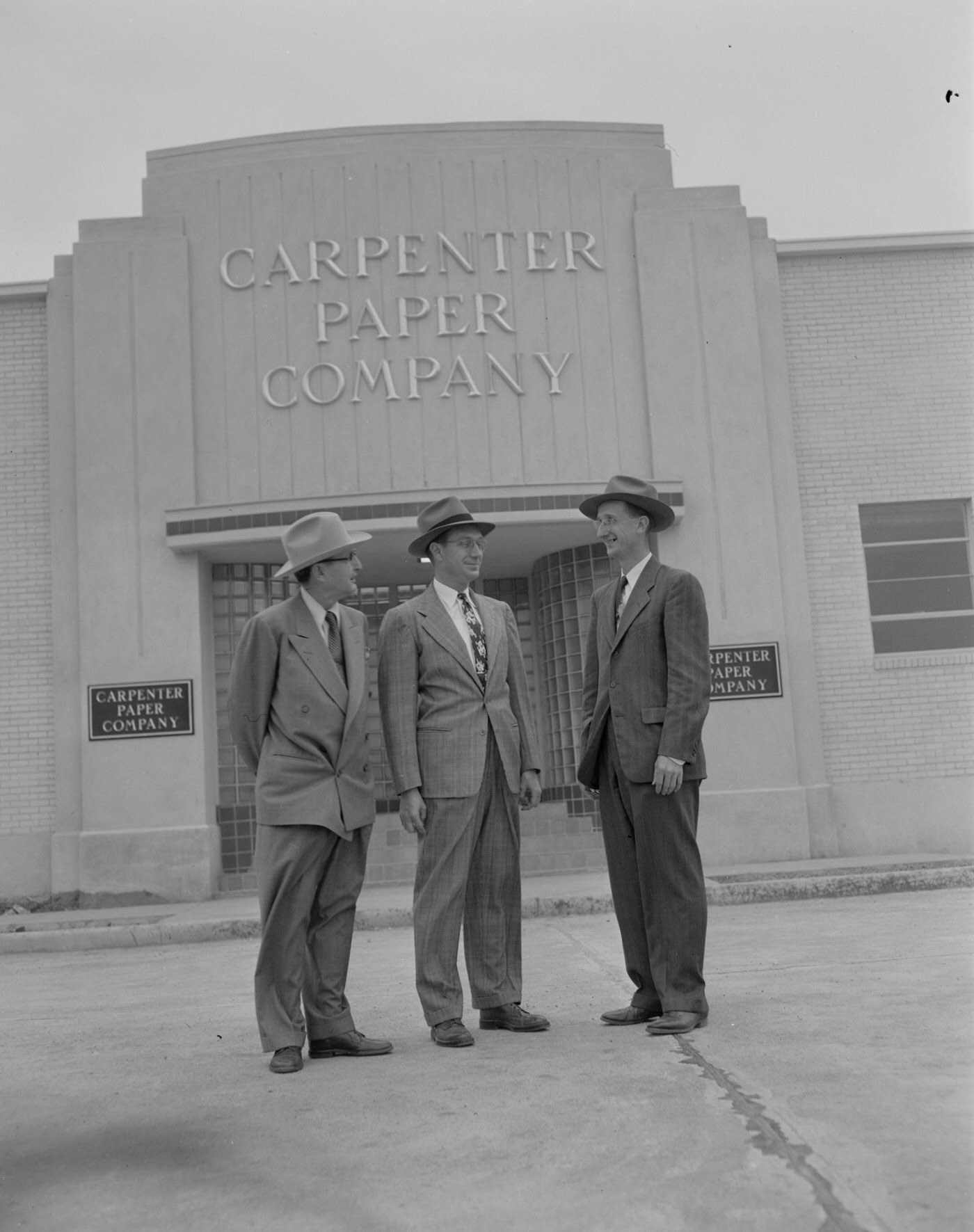 #67 Men in Front of Carpenter Paper Company Building, Austin, 1952.