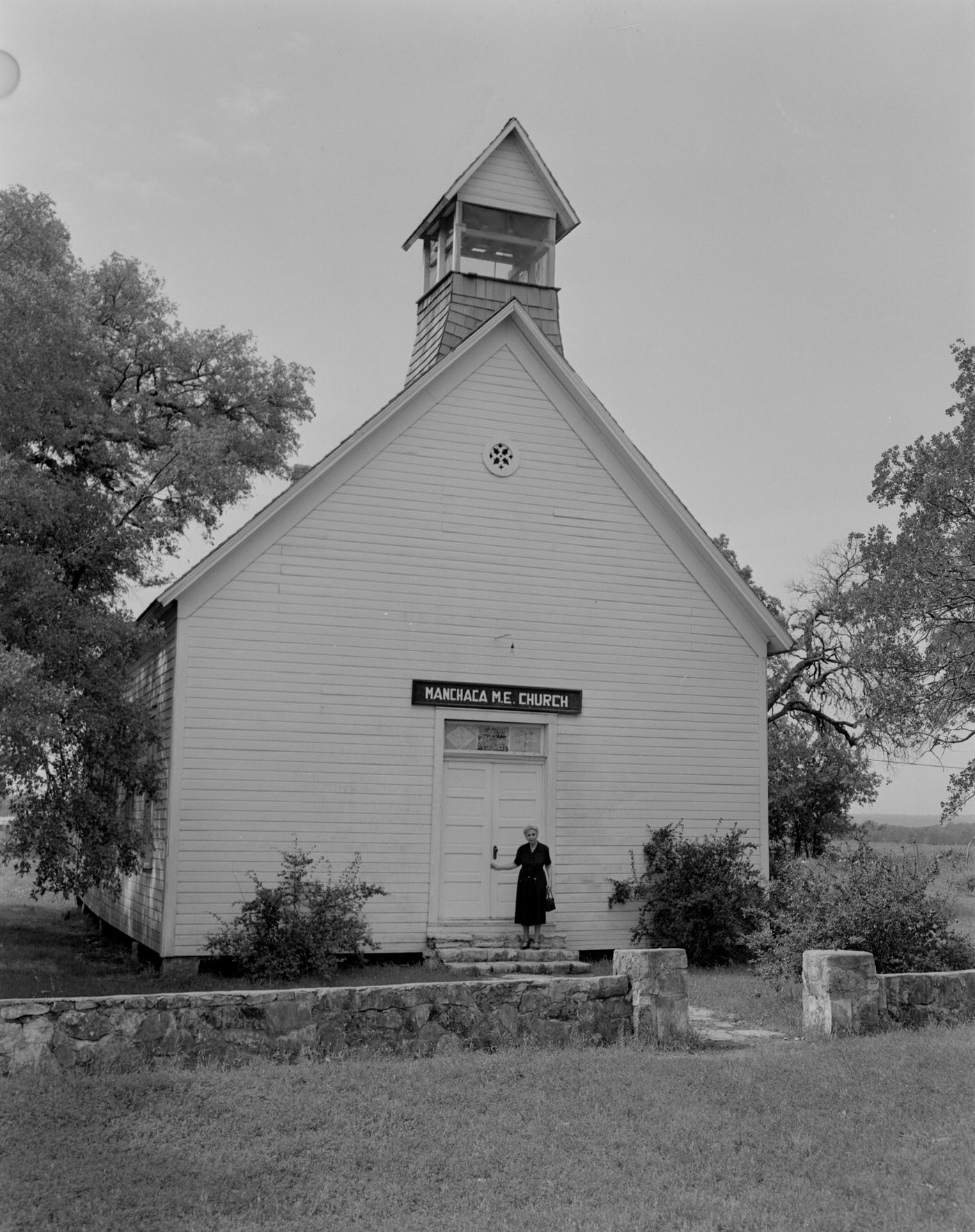 #78 Mrs. Thomas Outside Manchaca Methodist Church, 1953.