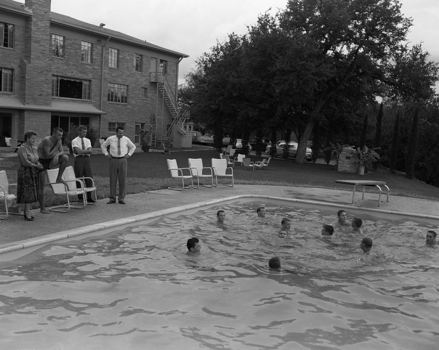 #105 Sigma Nu Members at New Swimming Pool, 1958.