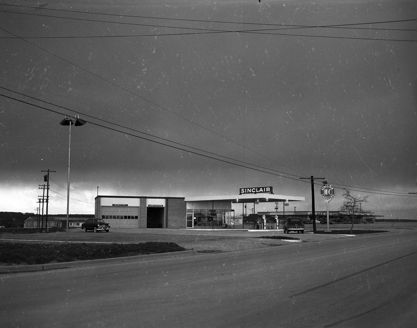 #166 Sinclair Gasoline Station, Allendale Village Shopping Center in Background, 1950.