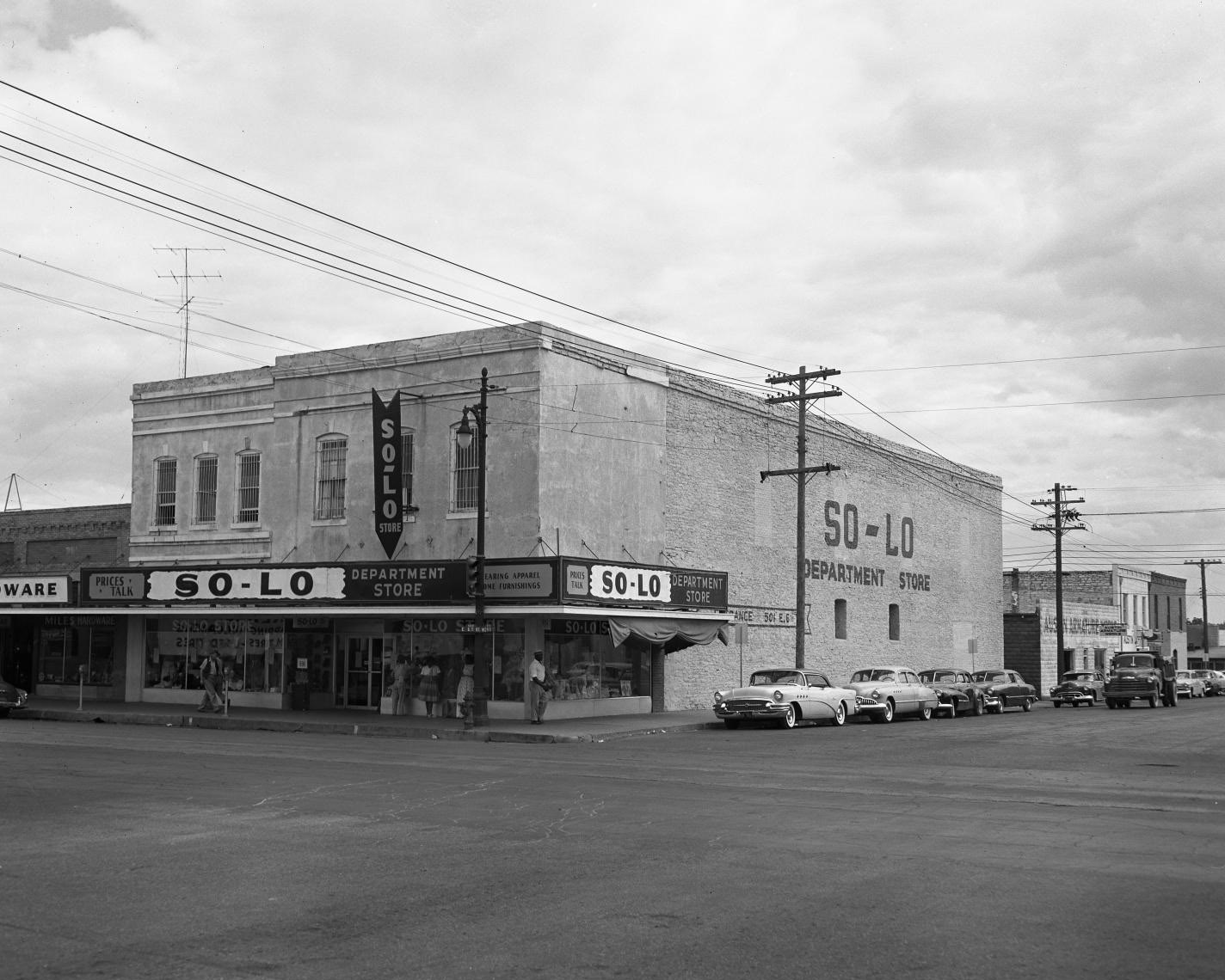 #168 So-Lo Dept. Store, Exterior Managed by Maynard J Wizig at 501 E 6th St., 1956.