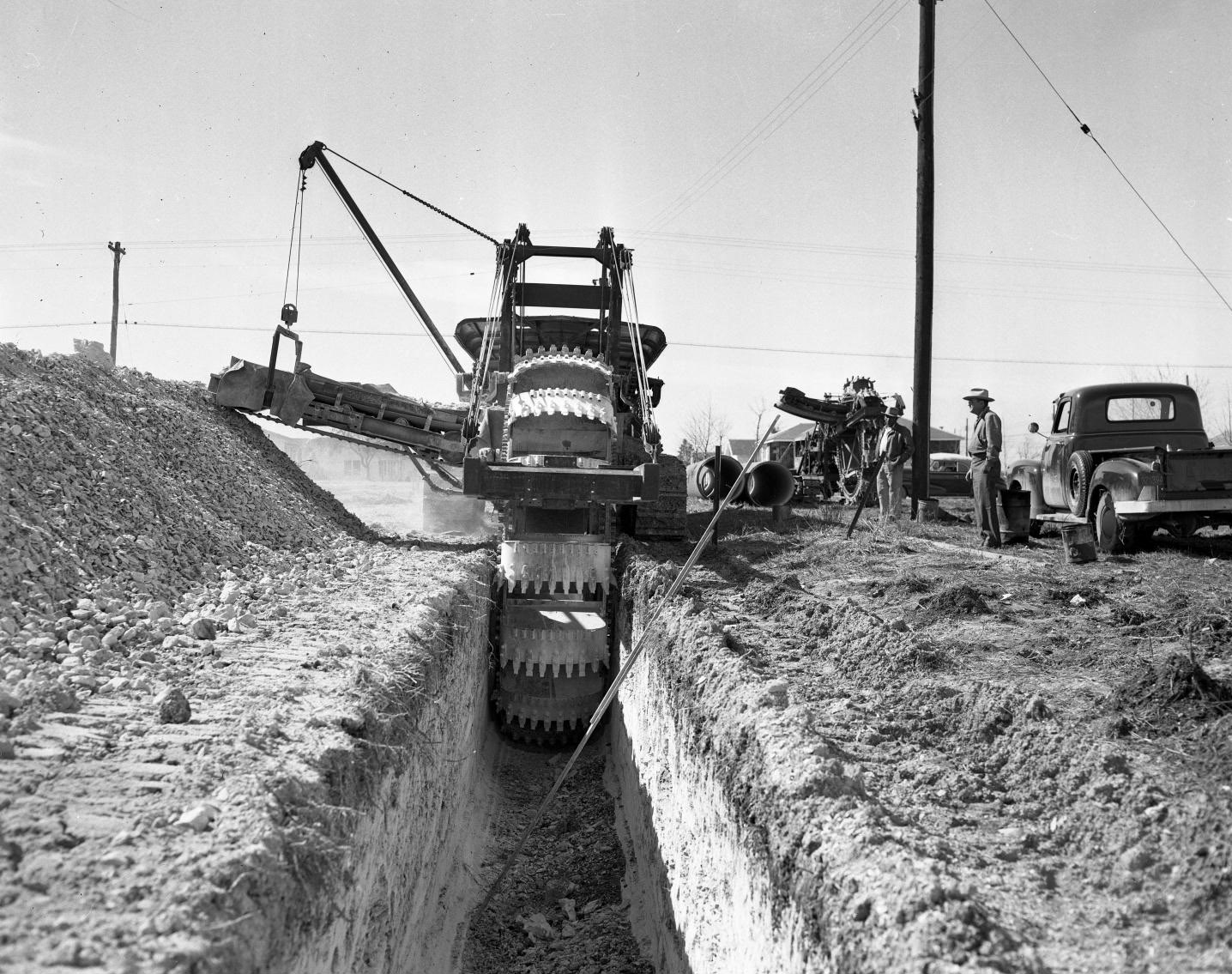 #213 View from Inside Dugout Trench with Trench-Digging Machinery, 1951.