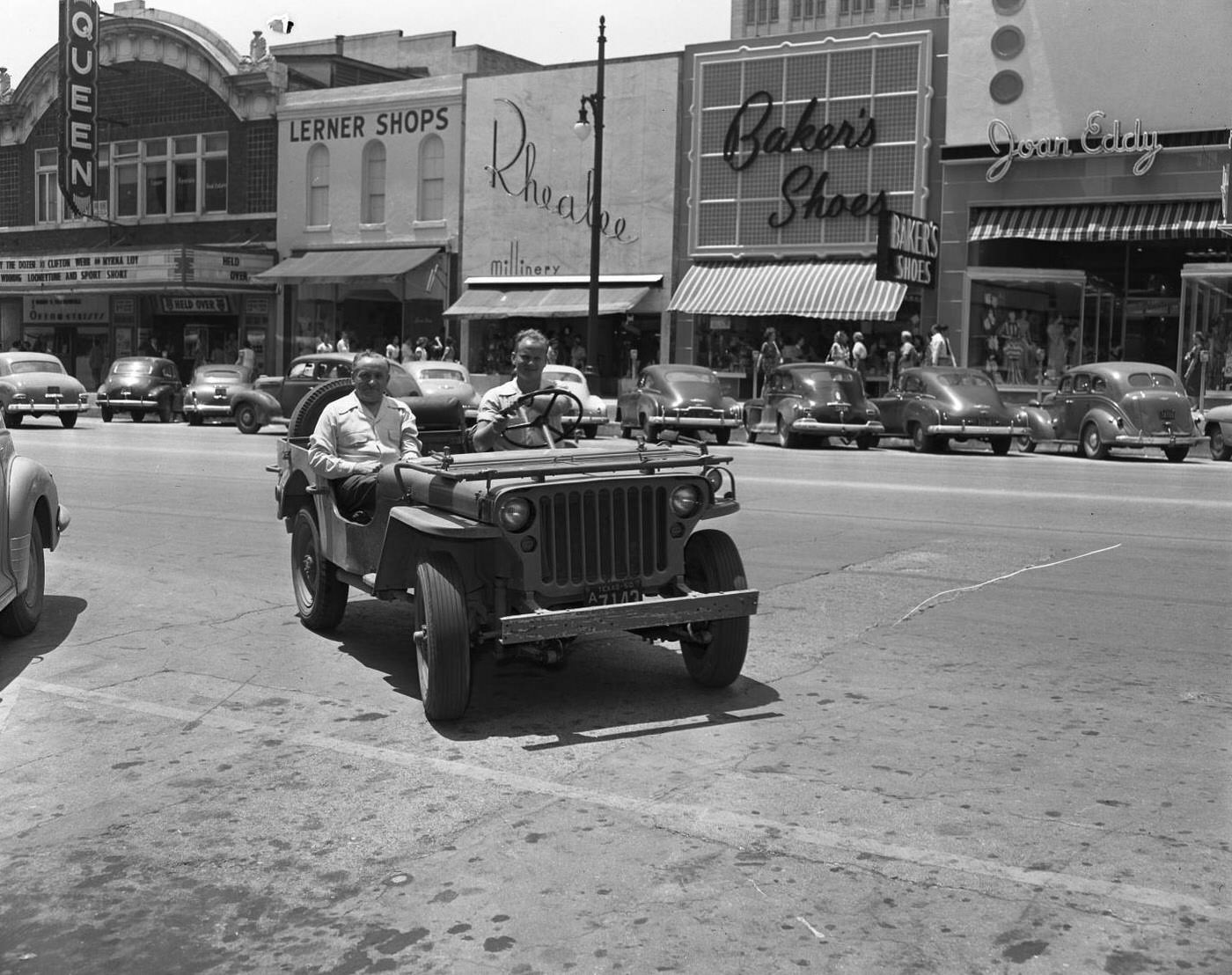 #120 Men in Jeep on Congress Ave, 1950.