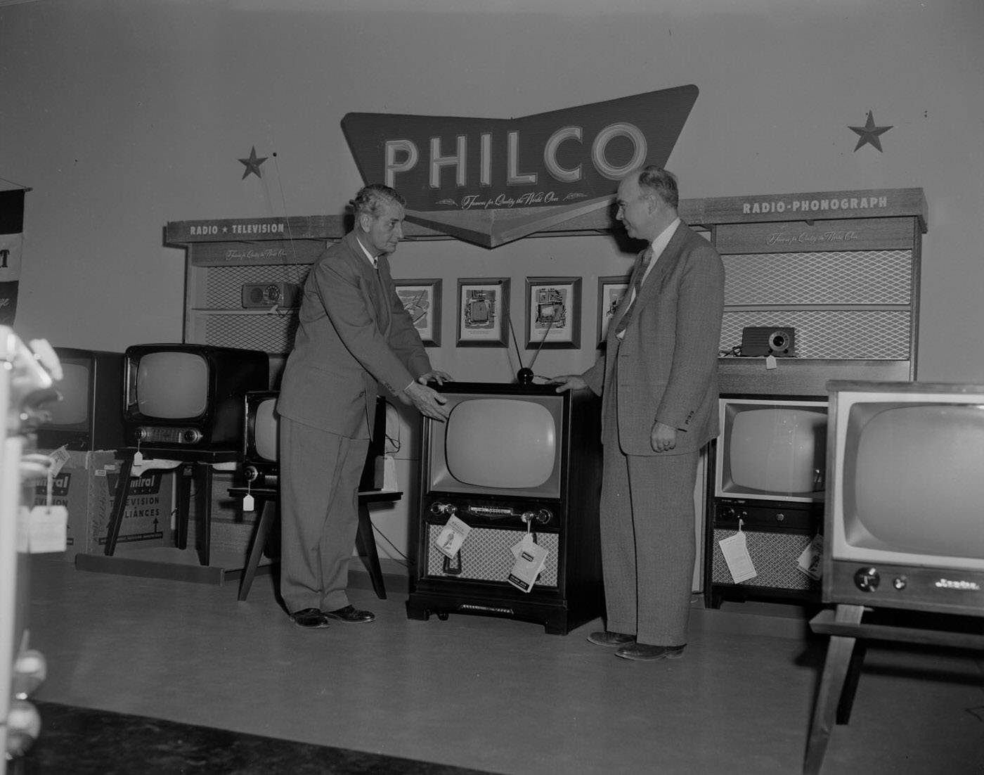 #121 Men in TV Showroom, 1954.