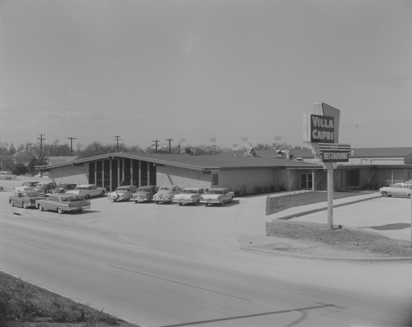 #230 Exterior of Villa Capri Restaurant and Parking Lot, 1959.