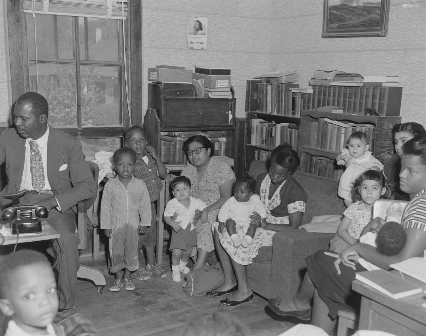 #127 Community Center Gathering with Families and Infants, 1957.