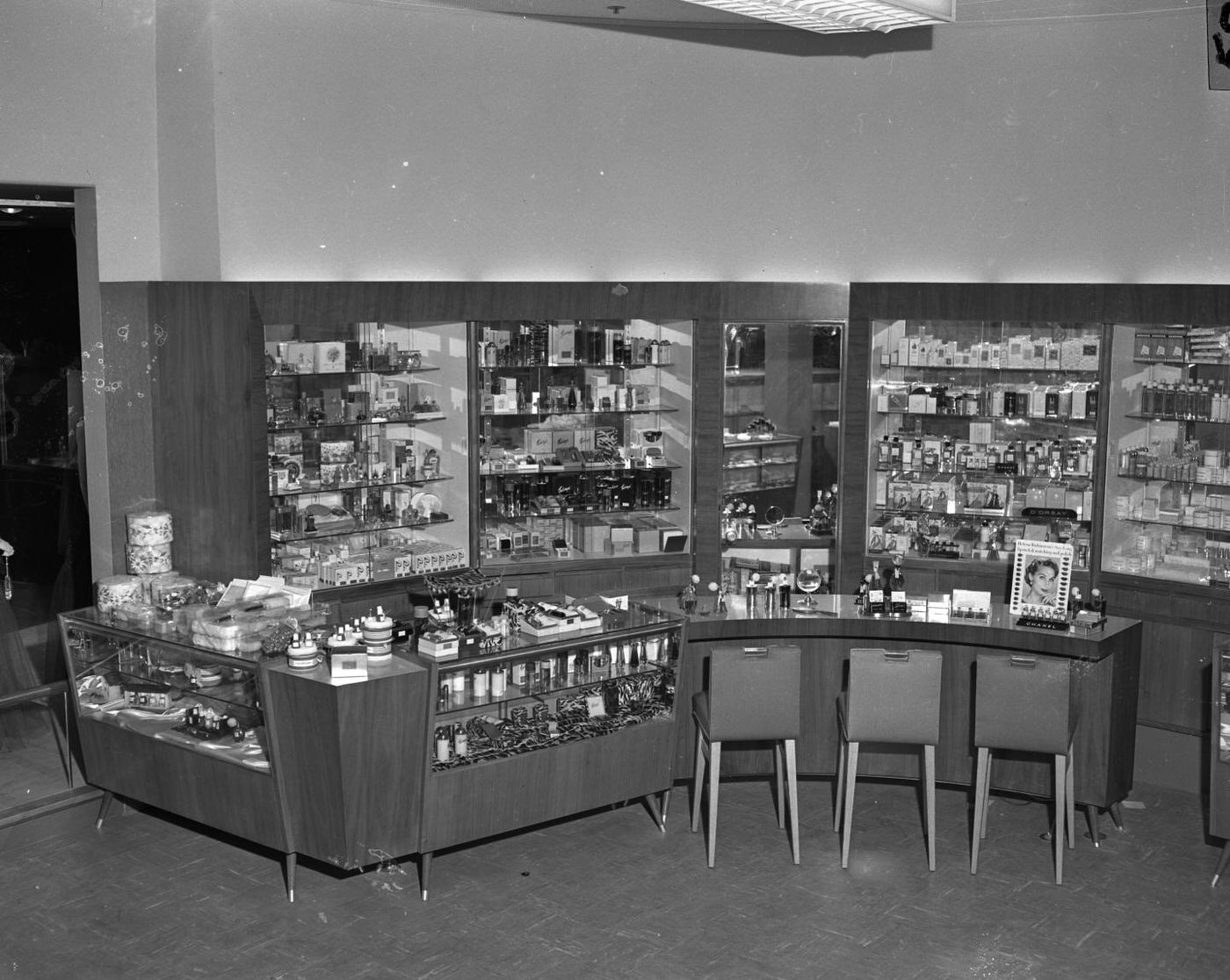 #131 Yarings Cosmetic Counter with Perfume and Makeup Displays, 1951.