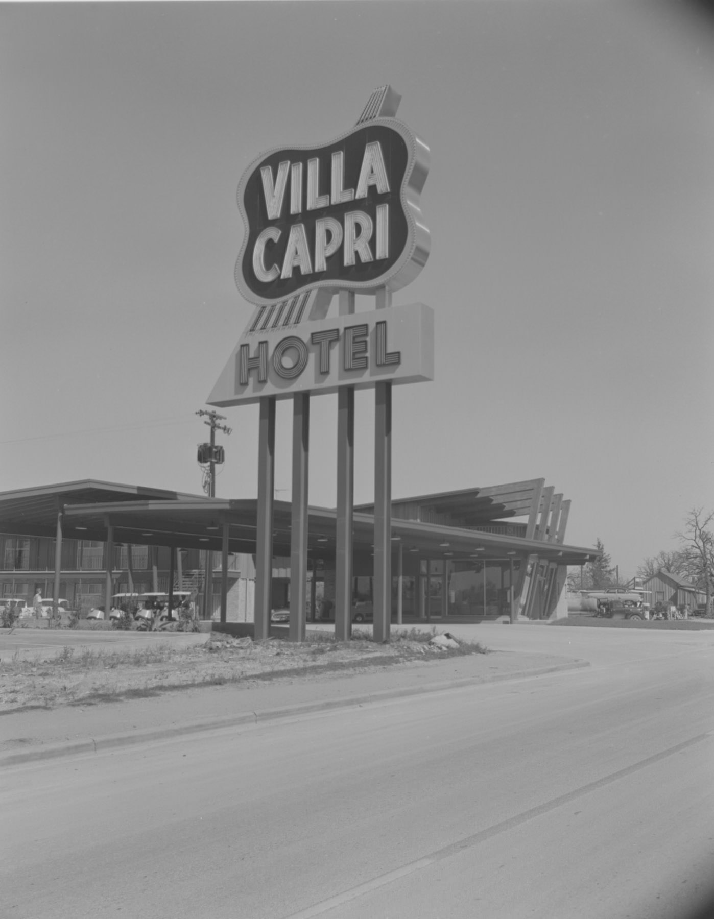#235 Exterior of Villa Capri Hotel Sign and Building, 1959.