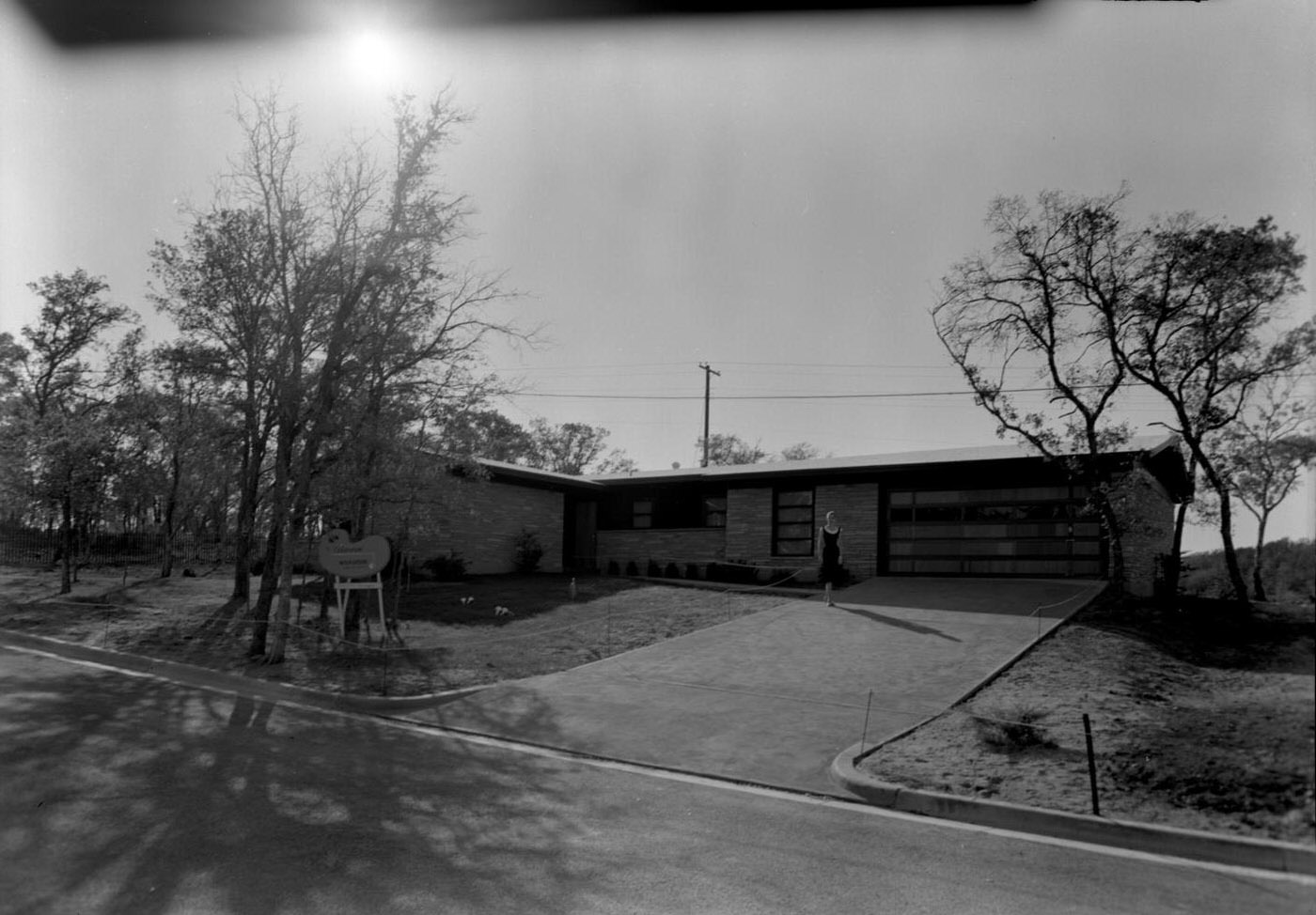 #239 Wilkerson Built Home with Woman in Driveway, 1956.
